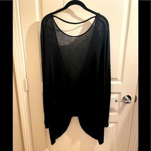 Free People twist open back sweater. Black